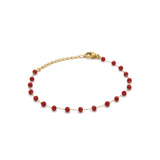 Bracelet Chill en acier inoxydable et perles synthétiques rouge.